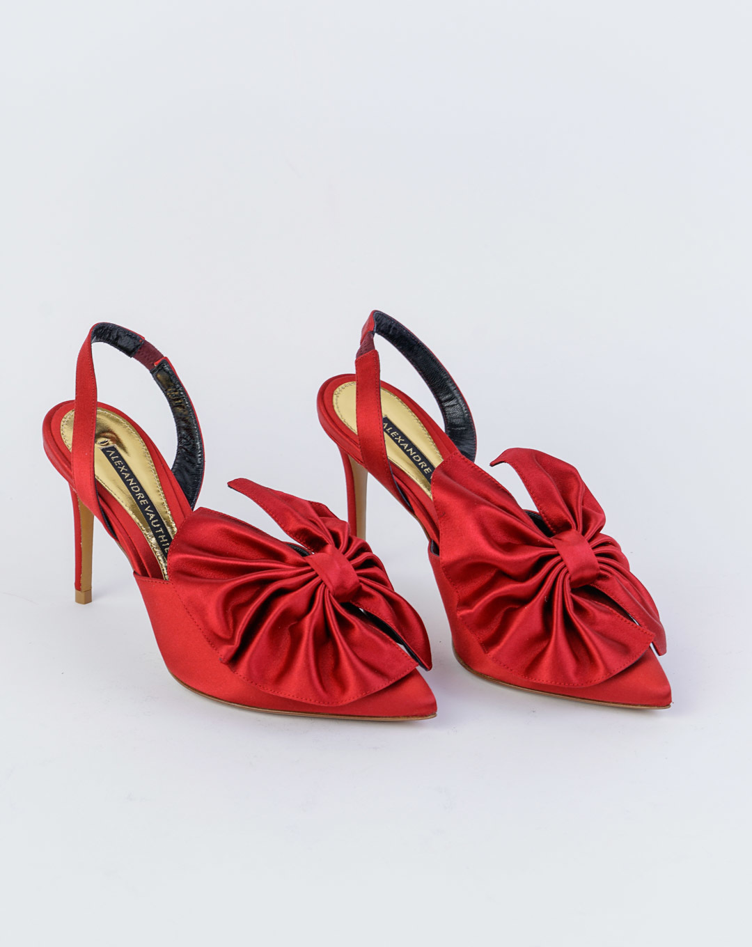 red satin pumps